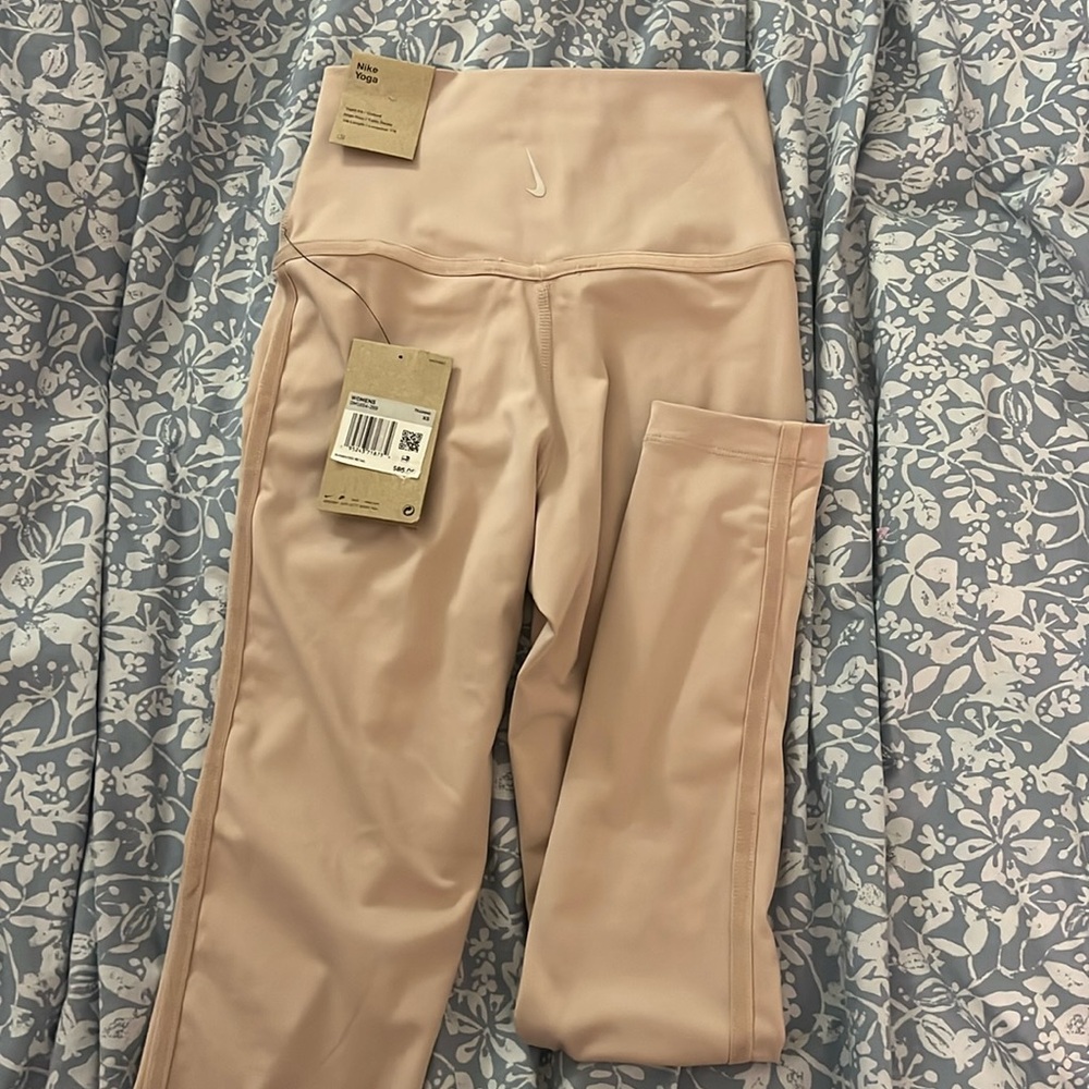 NWT Nike Yoga pink leggings